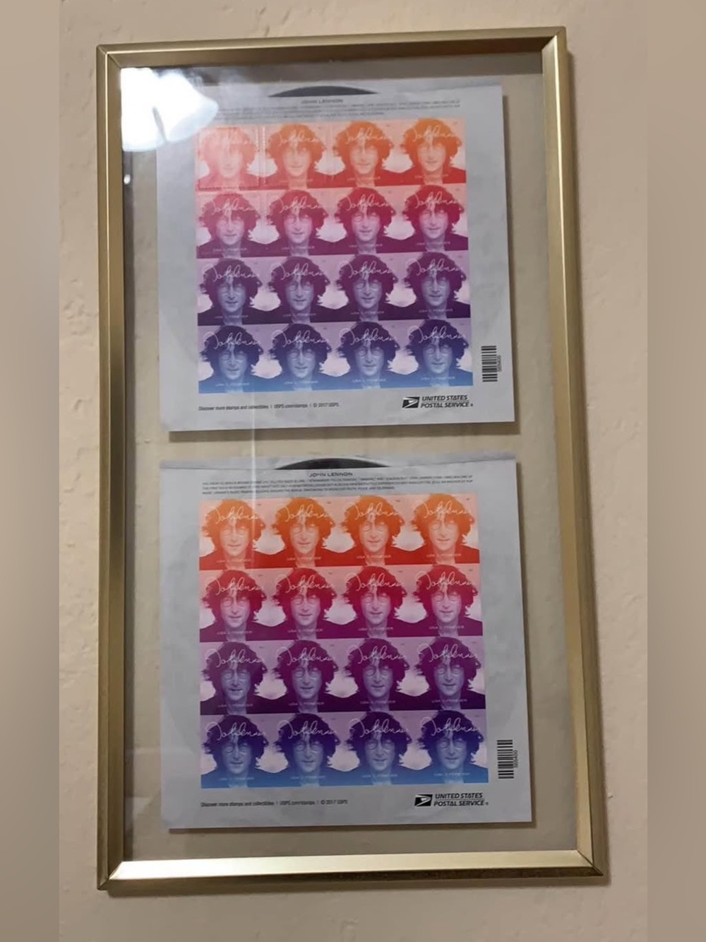 Framed John Lennon collectable stamps